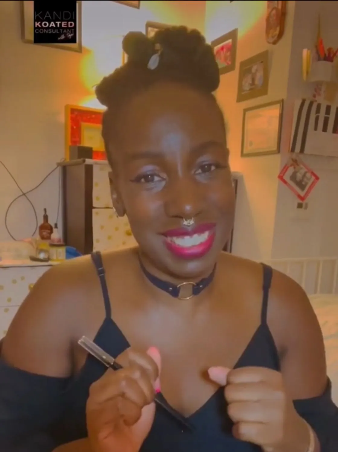 Taja smiling in her beauty studio